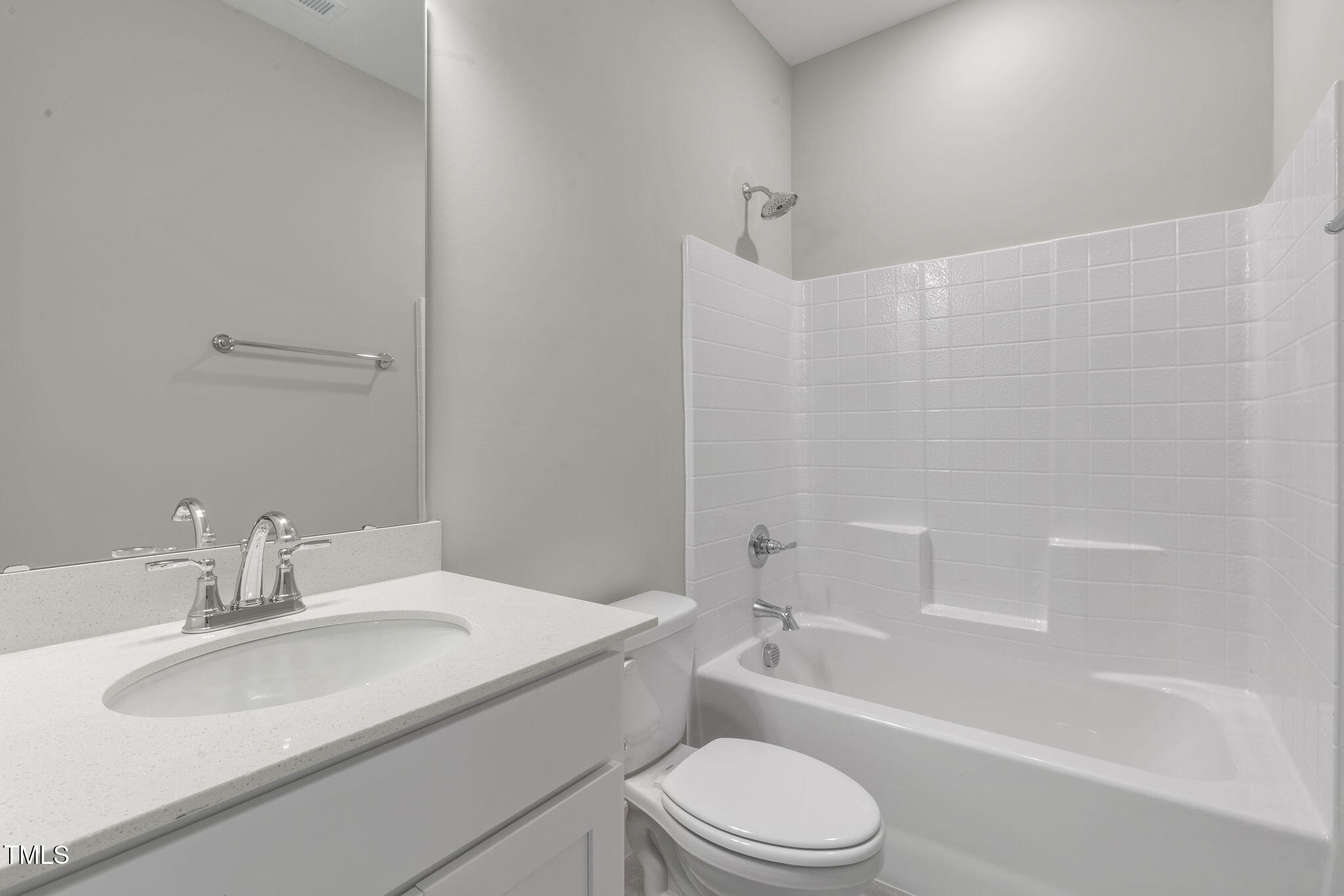 1556 Piney Fls Drive Wendell, NC 27591 - Photo 30 of 43 a bathroom with a sink toilet and a bathtub