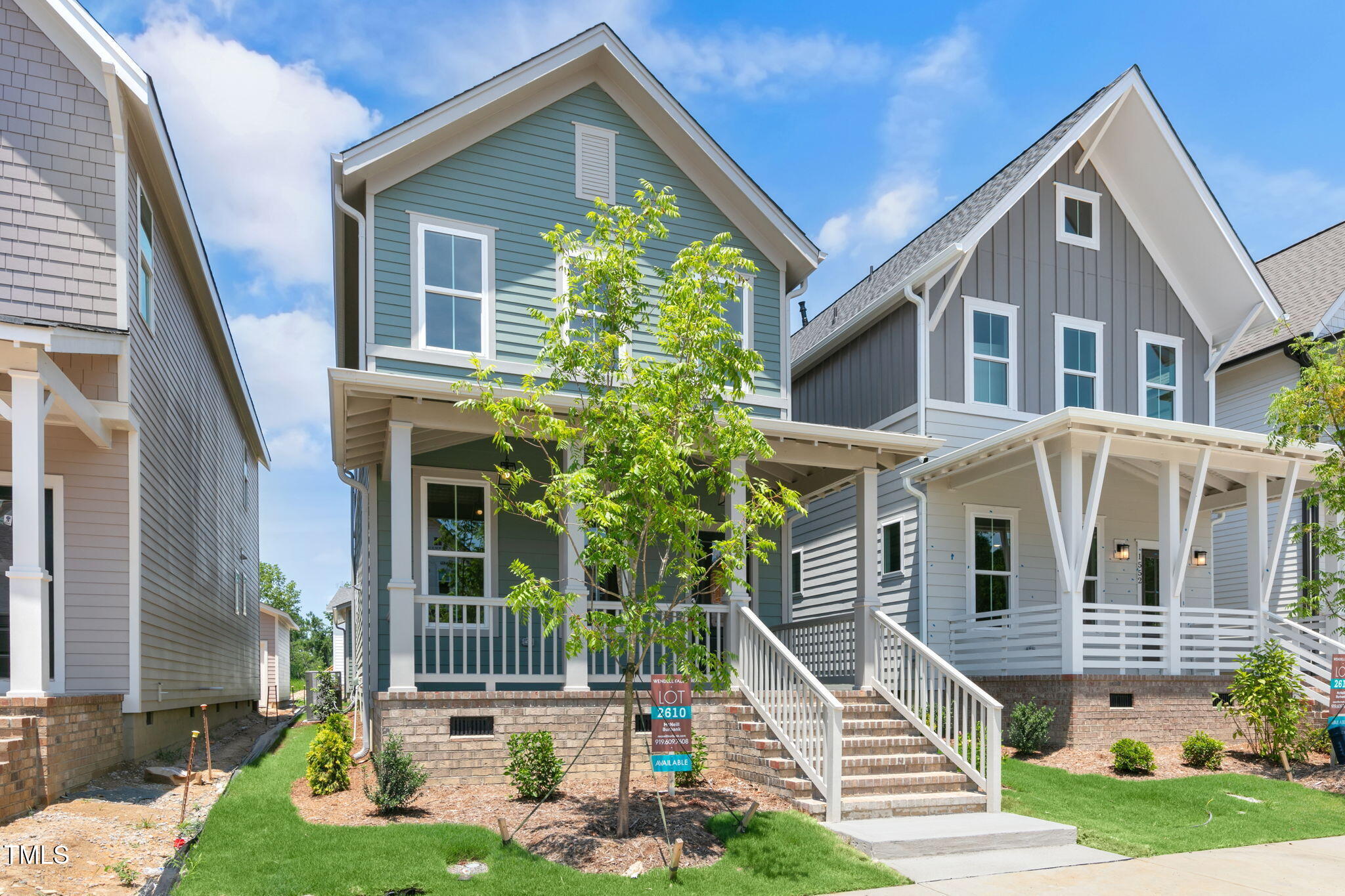 1556 Piney Fls Drive Wendell, NC 27591 - Photo 3 of 43 a front view of a house with a yard