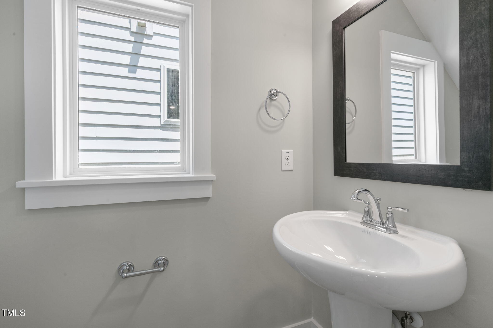 1556 Piney Fls Drive Wendell, NC 27591 - Photo 31 of 43 a bathroom with a sink and a window