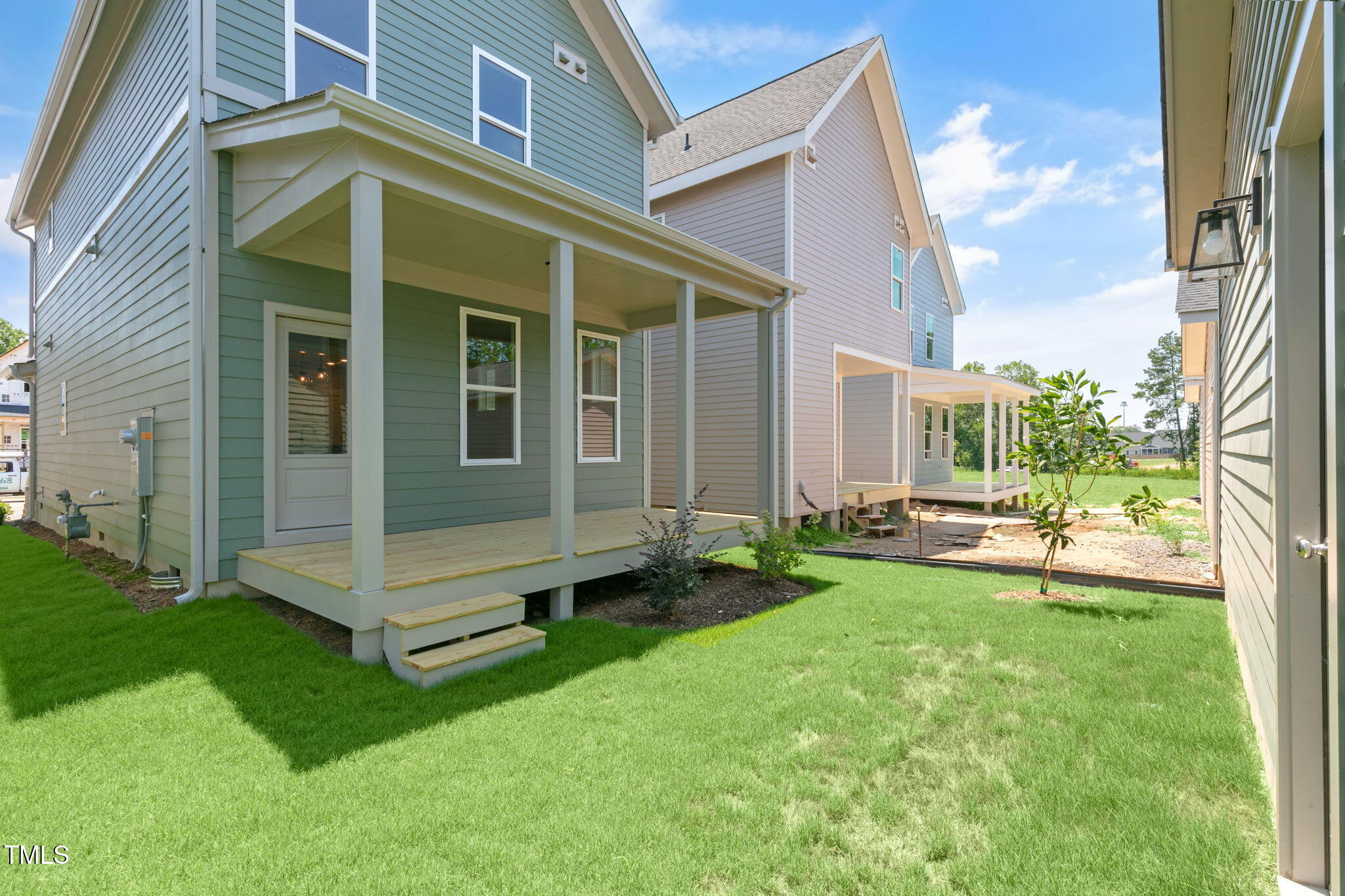 1556 Piney Fls Drive Wendell, NC 27591 - Photo 33 of 43 a view of a house with a yard and sitting area