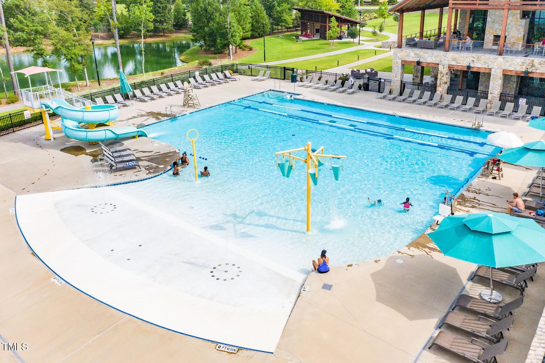 1556 Piney Fls Drive Wendell, NC 27591 - Photo 37 of 43 swimming pool view with a seating space