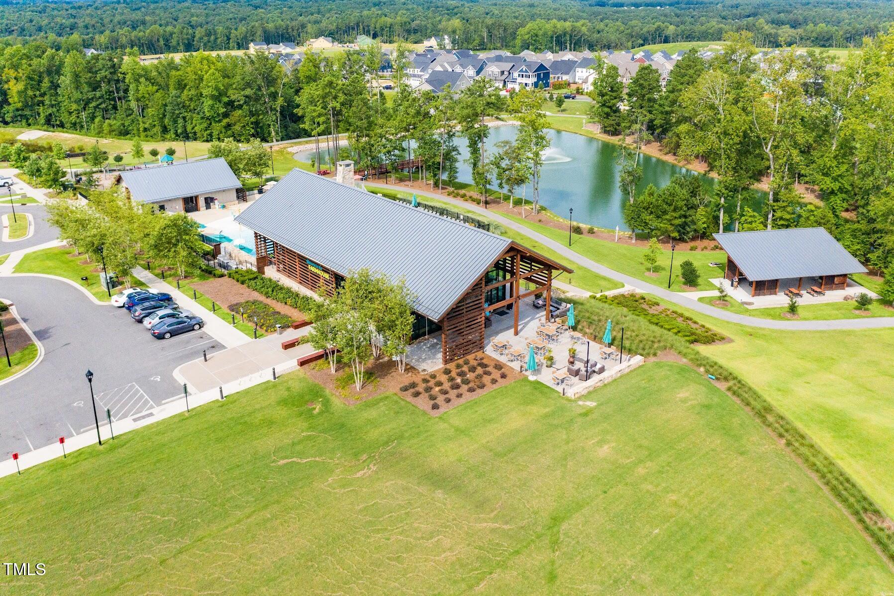 1556 Piney Fls Drive Wendell, NC 27591 - Photo 38 of 43 an aerial view of a house with a garden and swimming pool