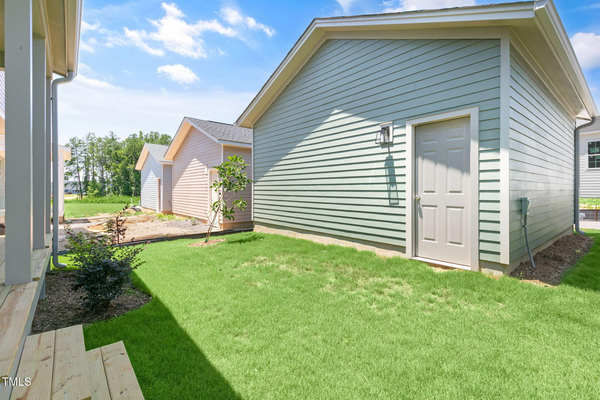 1556 Piney Fls Drive Wendell, NC 27591 - Photo 41 of 43 a view of a house with a backyard