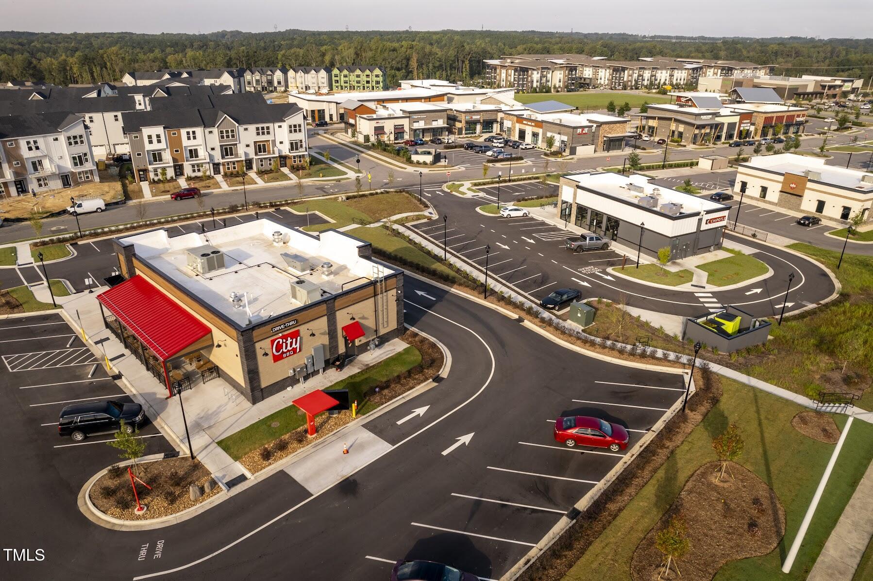 1556 Piney Fls Drive Wendell, NC 27591 - Photo 43 of 43 an aerial view of residential houses with outdoor space