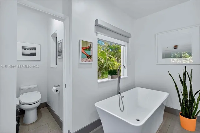 a bathroom with a sink and toilet