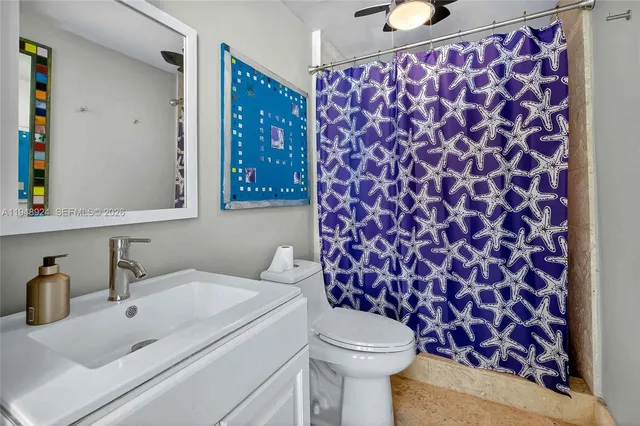 a bathroom with a sink and a toilet