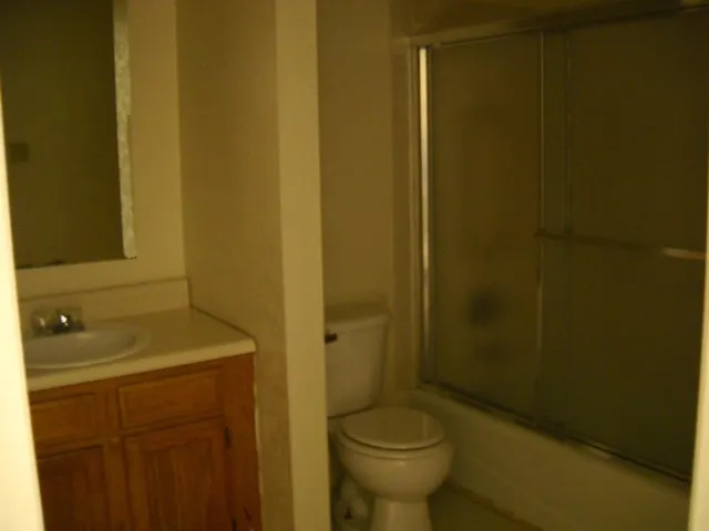 a bathroom with a sink and toilet