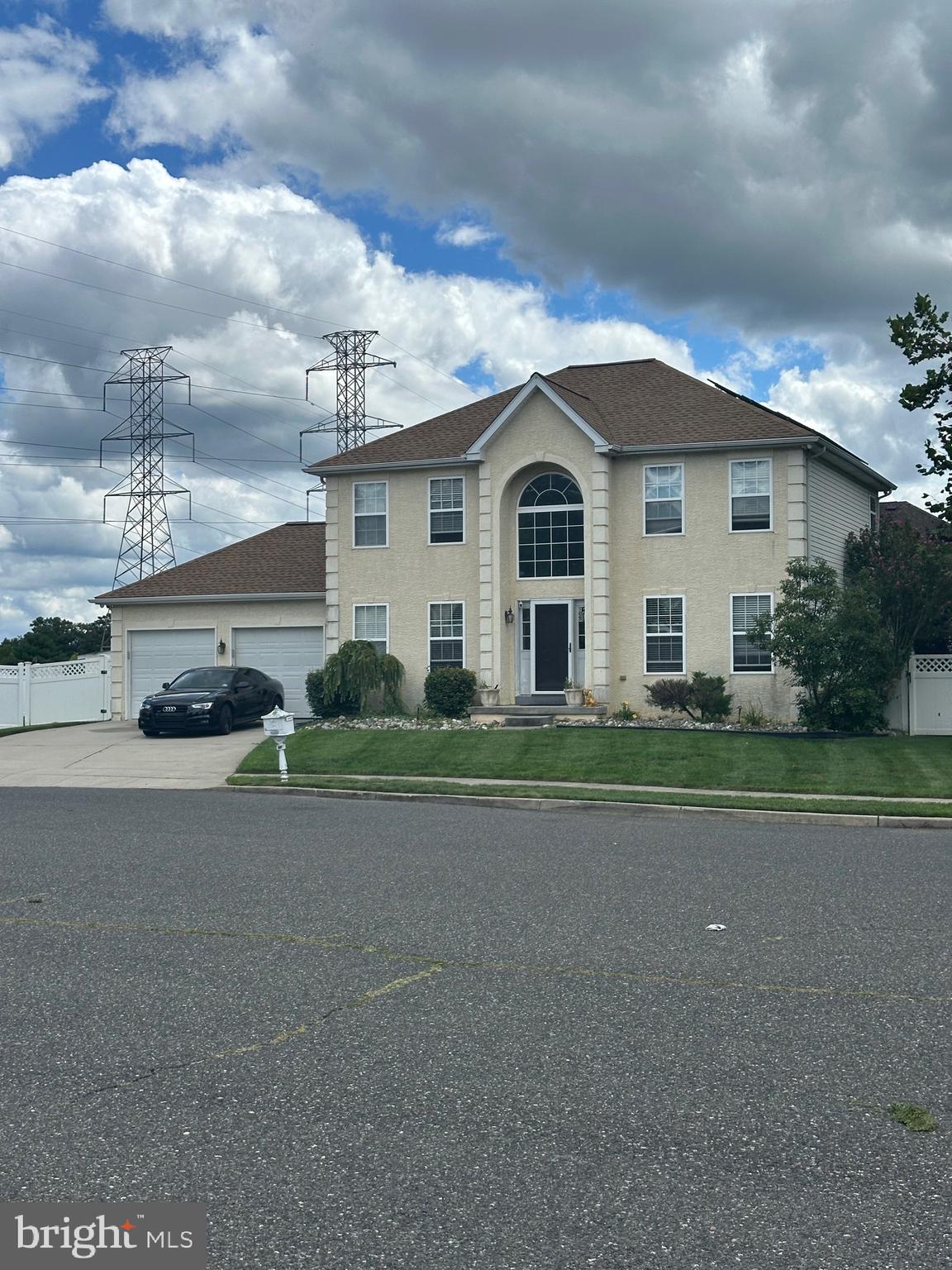 109 Harmony Cir Road Sicklerville, NJ 08081 - Photo 1 of 118 a front view of a house with a yard and garage