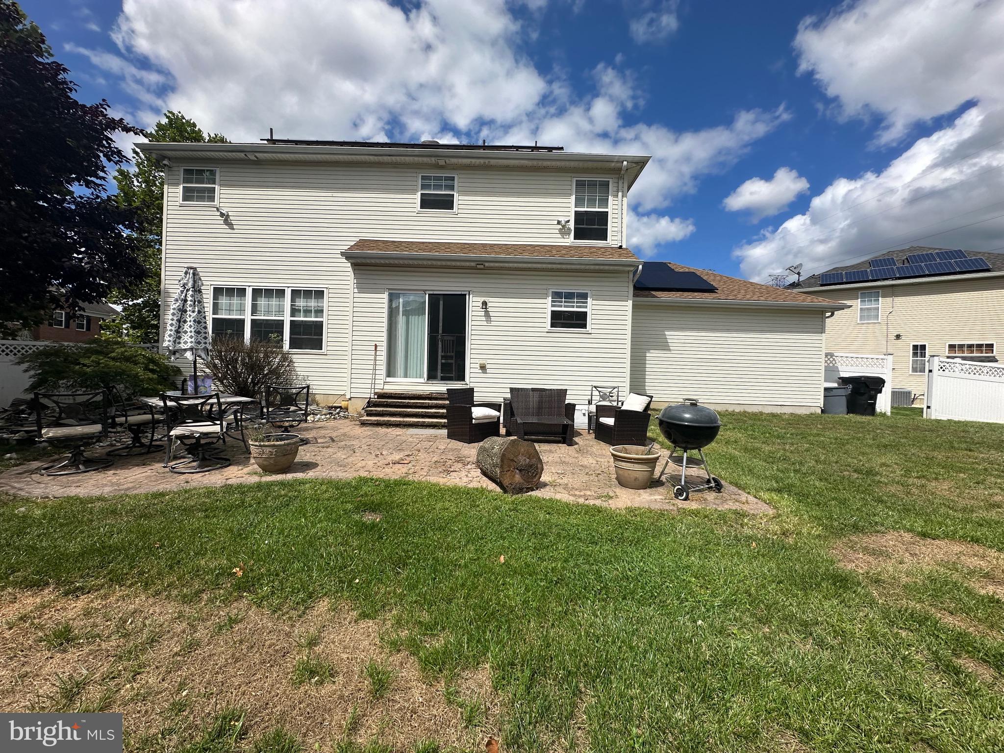 109 Harmony Cir Road Sicklerville, NJ 08081 - Photo 15 of 118 a view of a house with backyard sitting area and garden