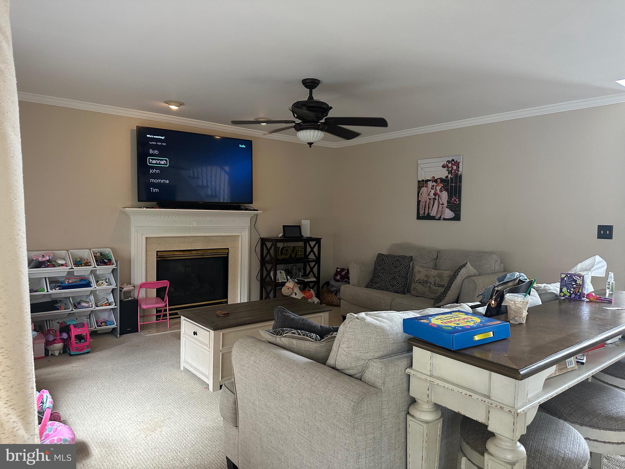 109 Harmony Cir Road Sicklerville, NJ 08081 - Photo 40 of 118 a living room with furniture a flat screen tv and a fireplace