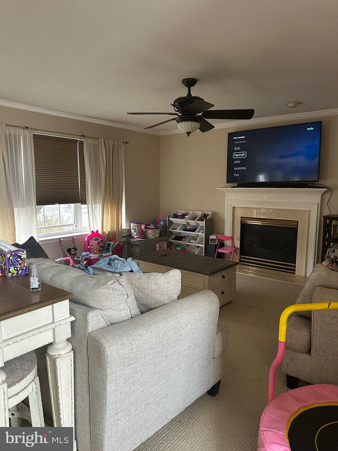 109 Harmony Cir Road Sicklerville, NJ 08081 - Photo 42 of 118 a living room with furniture a flat screen tv and a fireplace