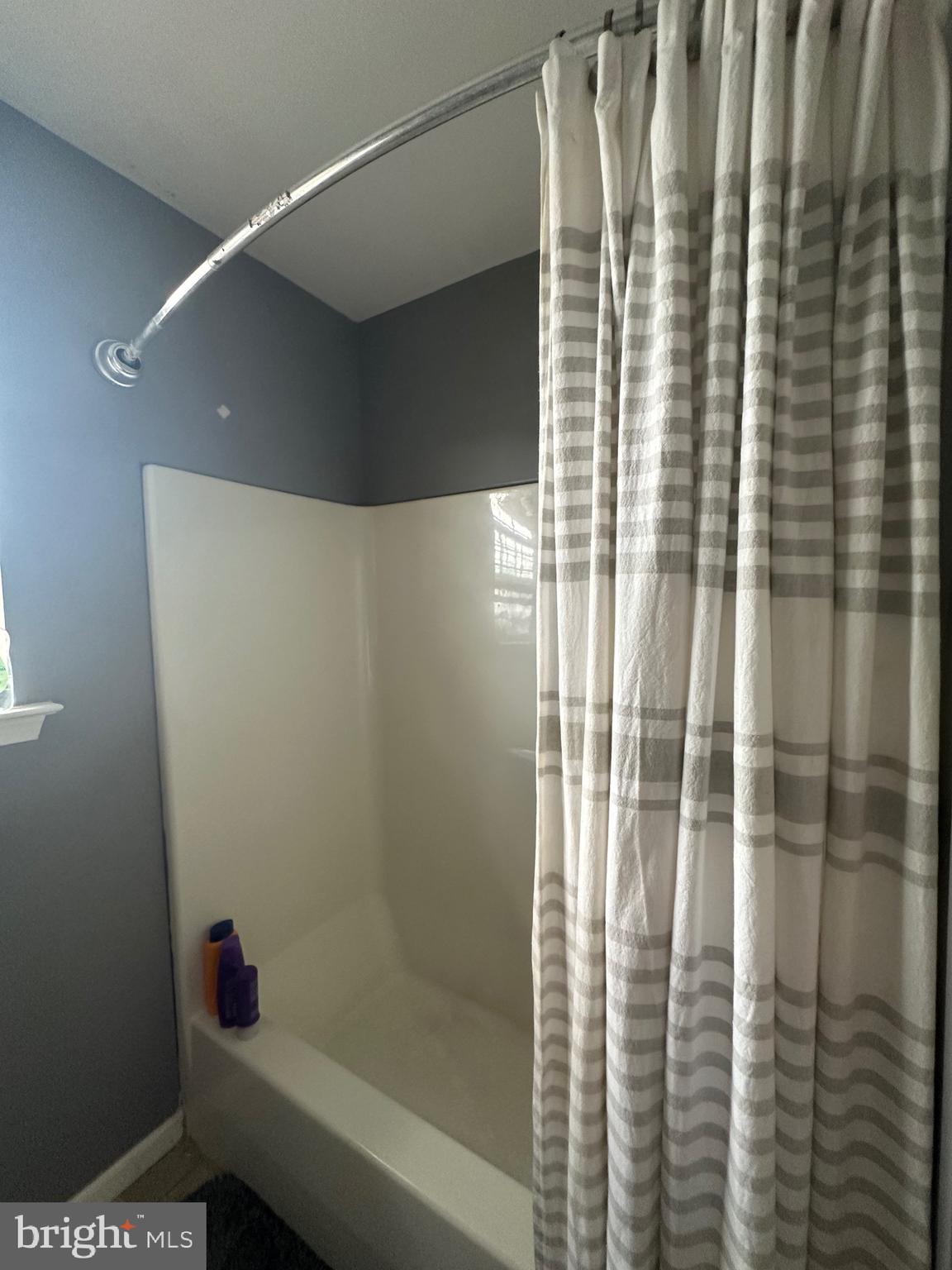 109 Harmony Cir Road Sicklerville, NJ 08081 - Photo 82 of 118 a bathroom with a shower curtain