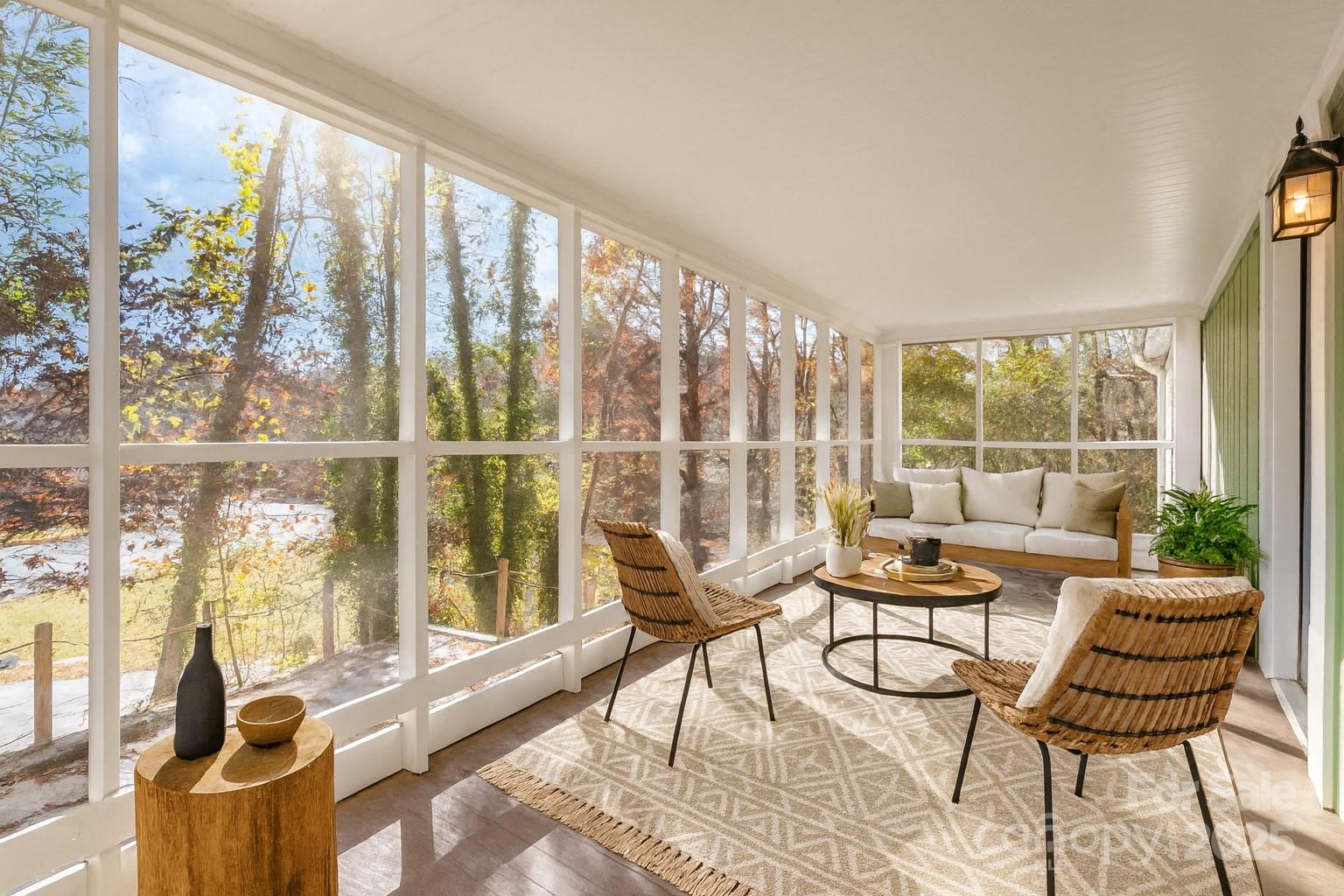 243 Boys Camp Road Black Mountain, NC 28711 - Photo 3 of 21 a living room with furniture and a large window
