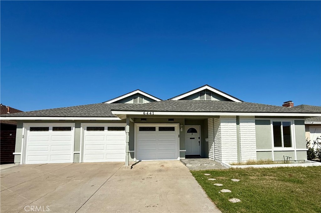 6441 St Paul Circle, Unit B Huntington Beach, CA 92647 - Photo 8 of 8 front view of a house with a yard