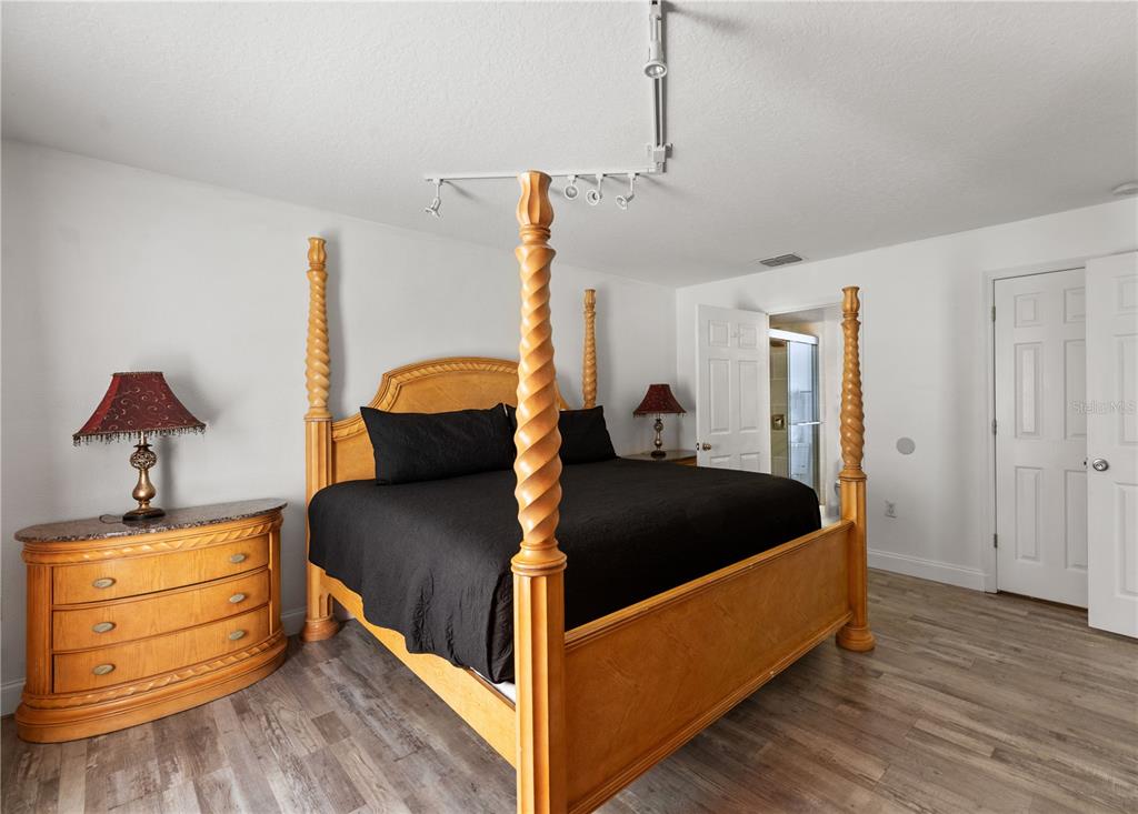 51 Uhl Path Palm Coast, FL 32164 - Photo 21 of 68 a living room with furniture and wooden floor
