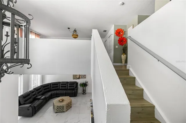 a bed room with a bed and a window