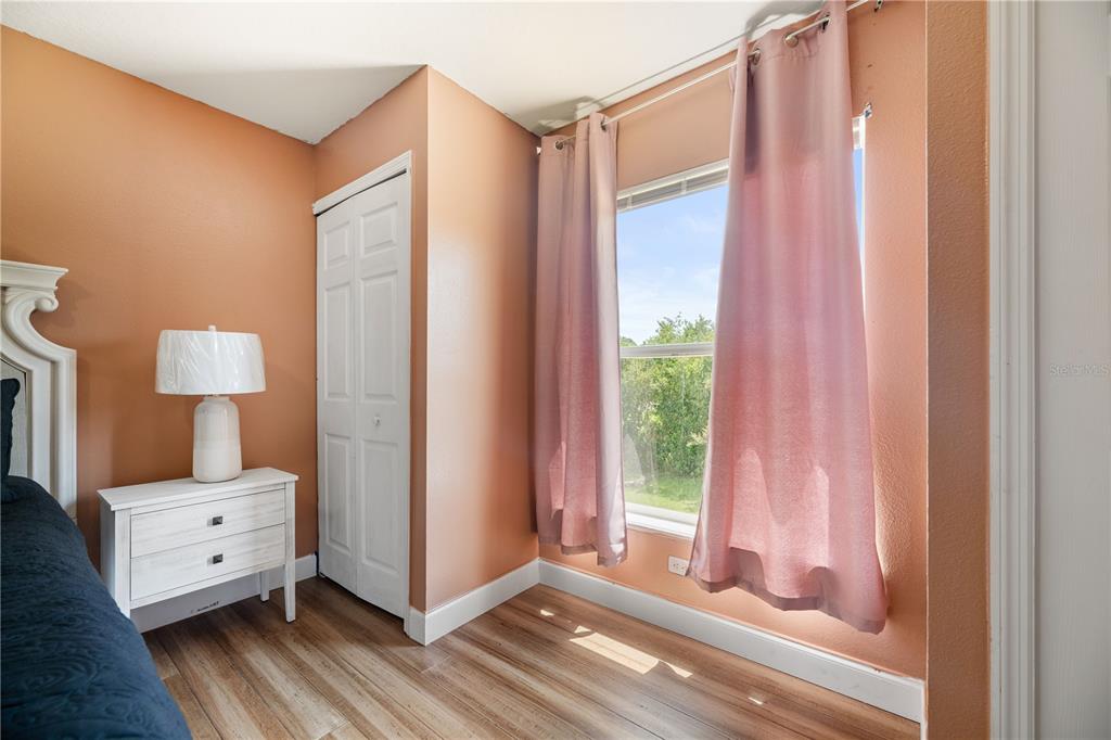 51 Uhl Path Palm Coast, FL 32164 - Photo 35 of 68 a bed room with a bed and a window