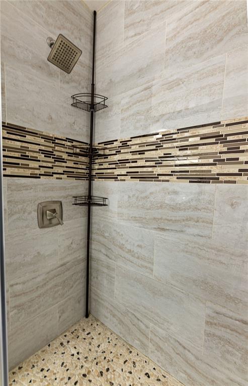 51 Uhl Path Palm Coast, FL 32164 - Photo 40 of 68 a bathroom with a shower