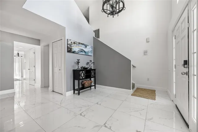 a living room with furniture and a table