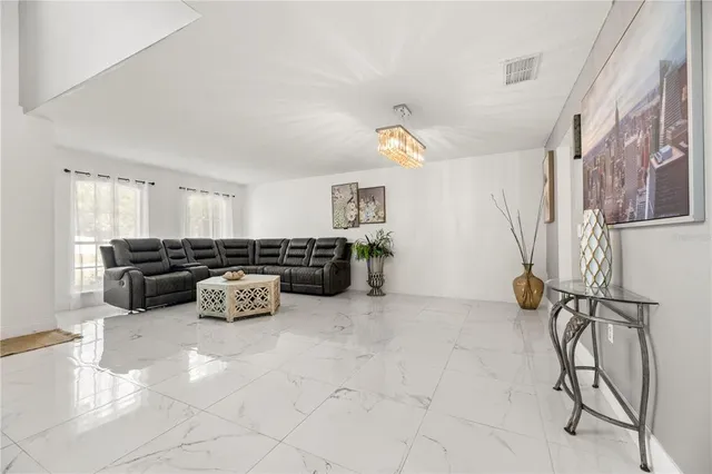a kitchen with a refrigerator a sink and dishwasher
