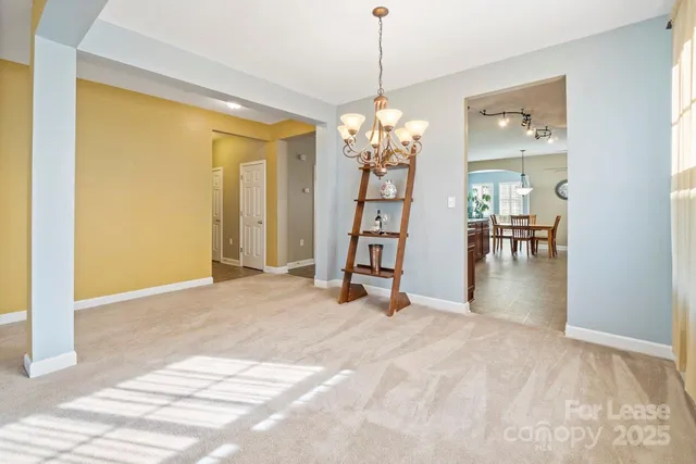a view of a livingroom with a chandelier