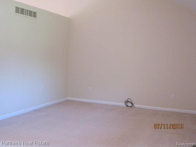 5818 Fisher Road Howell, MI 48855 - Photo 2 of 19 Great Room w/Vaulted Ceilings