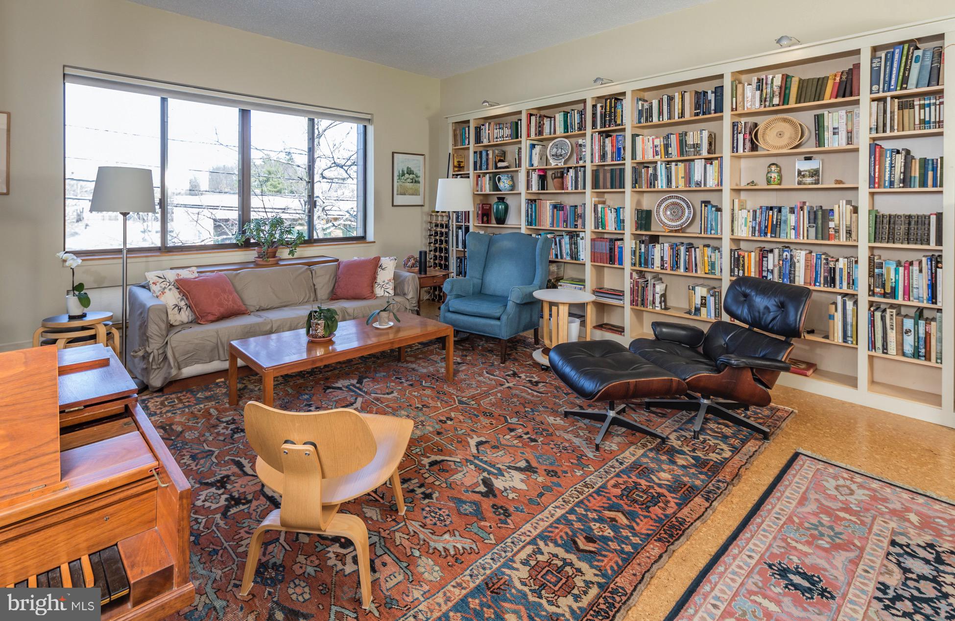 1 Markham Road, Unit 2D Princeton, NJ 08540 - Photo 8 of 25 Living Room with Bookshelves