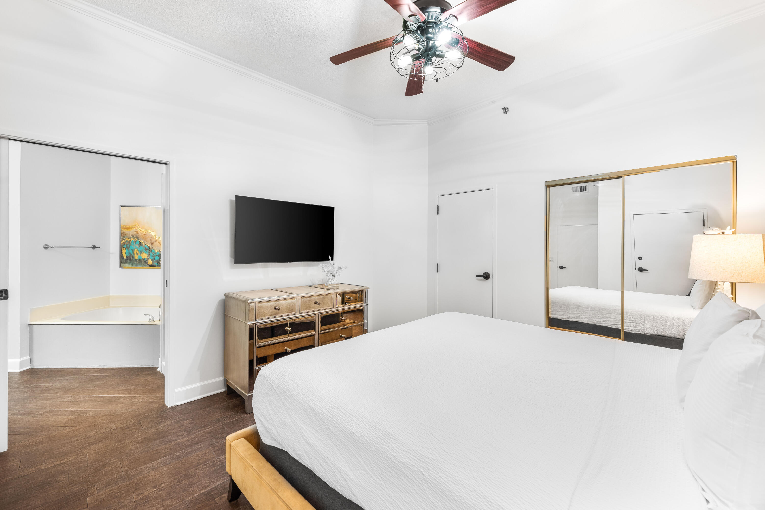 550 Tops'l Beach Boulevard, Unit 1509 Miramar Beach, FL 32550 - Photo 13 of 31 a bedroom with a bed and a flat screen tv