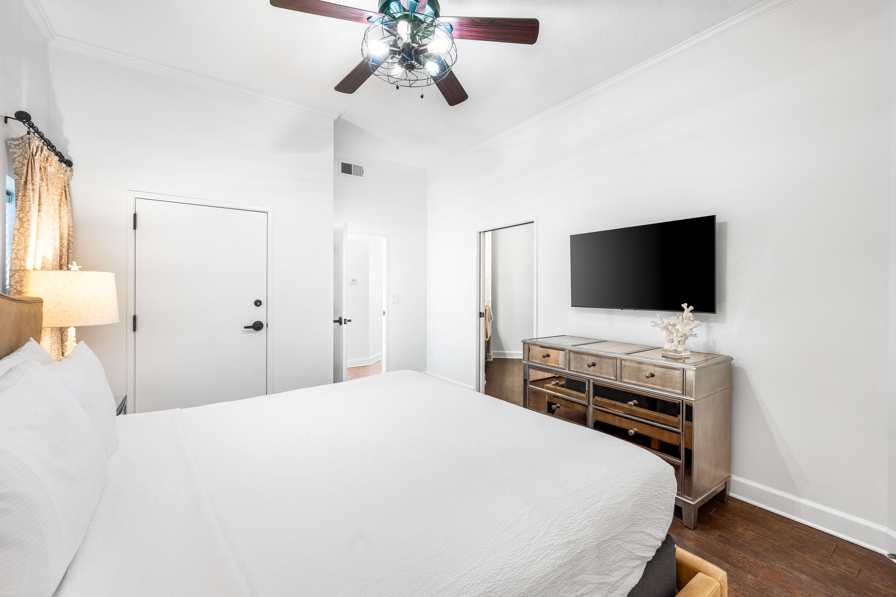 550 Tops'l Beach Boulevard, Unit 1509 Miramar Beach, FL 32550 - Photo 14 of 31 a bedroom with a flat screen tv and a bed