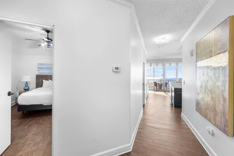 a view of a bedroom from a hallway