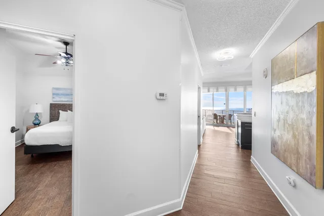 a view of a bedroom from a hallway