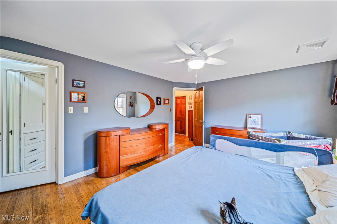 2710 Edgehill Road Cleveland, OH 44106 - Photo 32 of 44 Bedroom featuring hardwood / wood-style flooring and ceiling fan