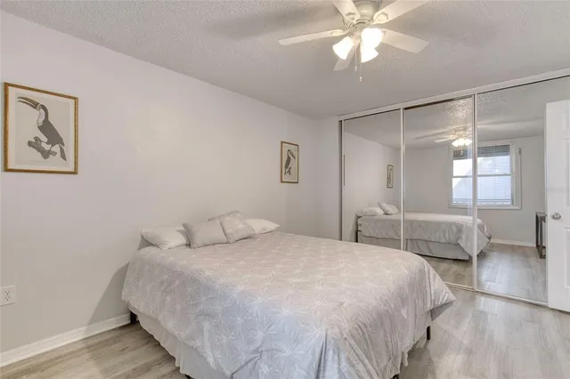 a kitchen with a sink cabinets and window