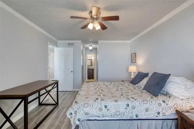 walk in closet with a mirror