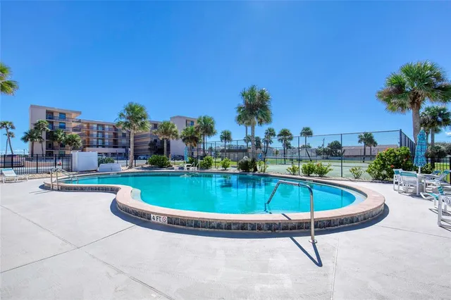 a view of a water with a building in the background