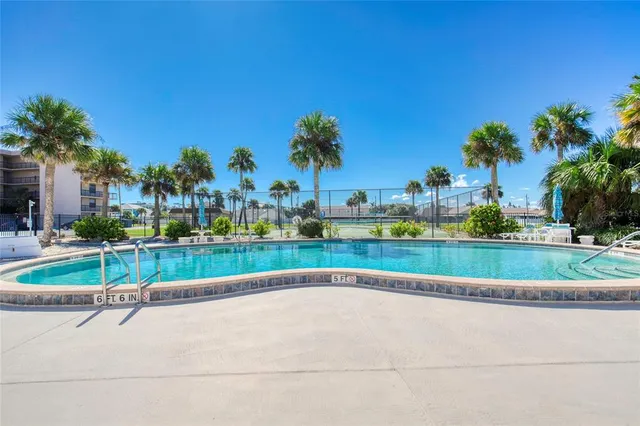 a view of a buildings with many windows