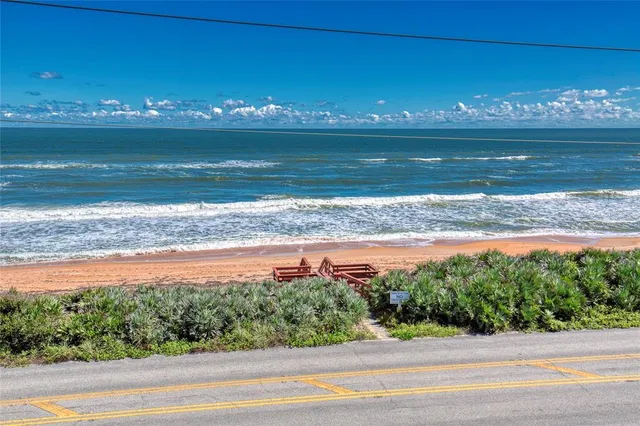 a view of balcony with a potted plant