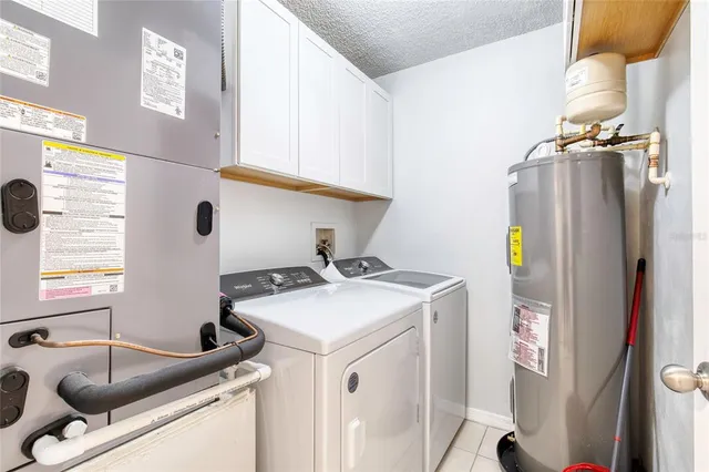 a bedroom with a bed and a table