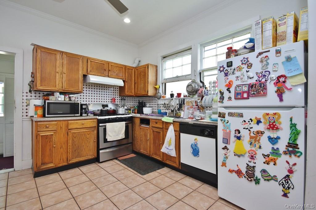 219 Spring Street Ossining, NY 10562 - Photo 5 of 19 Kitchen has stainless stove