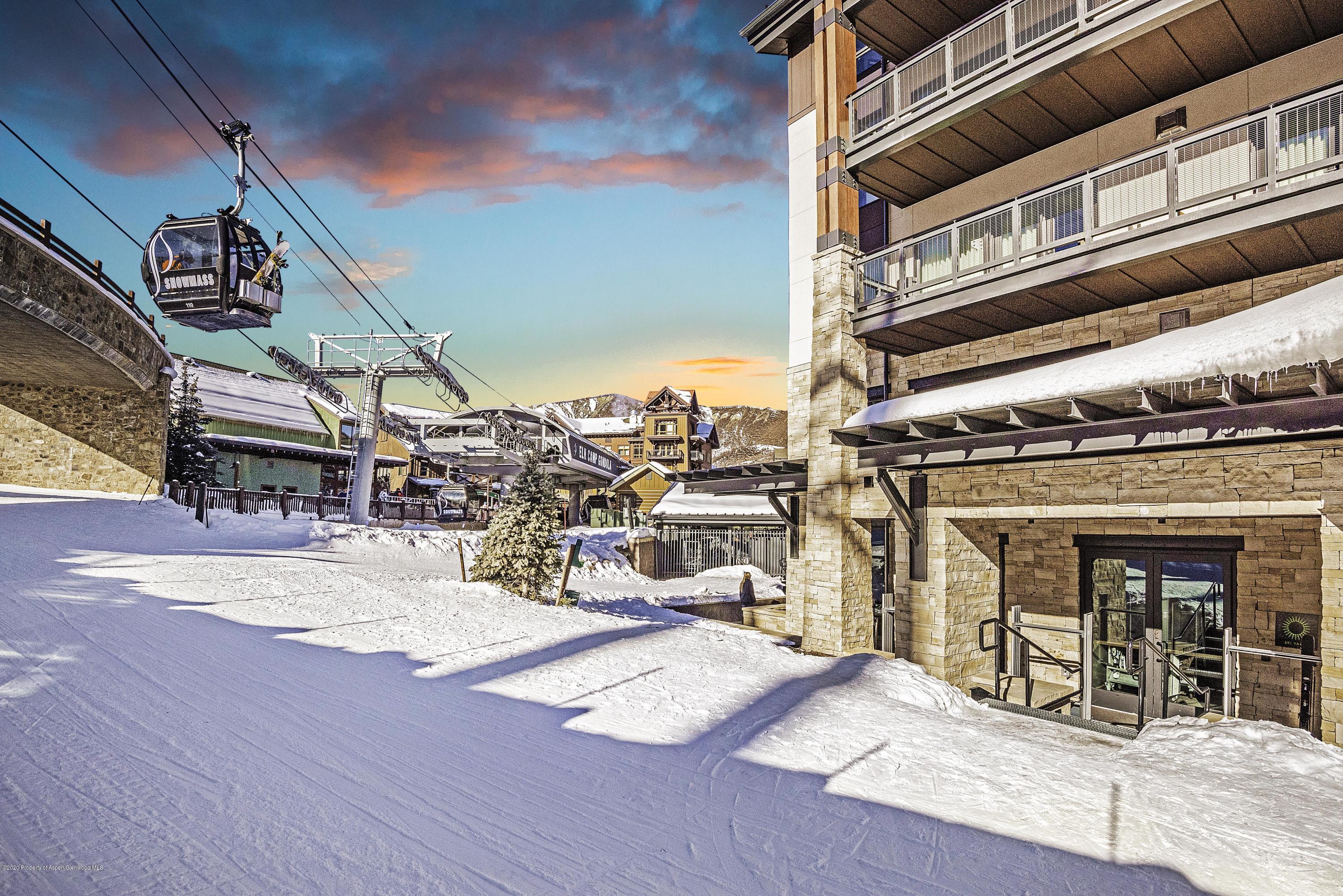 65 Wood Road, Unit 433 Snowmass Village, CO 81615 - Photo 22 of 27 a view of a building with a outdoor space