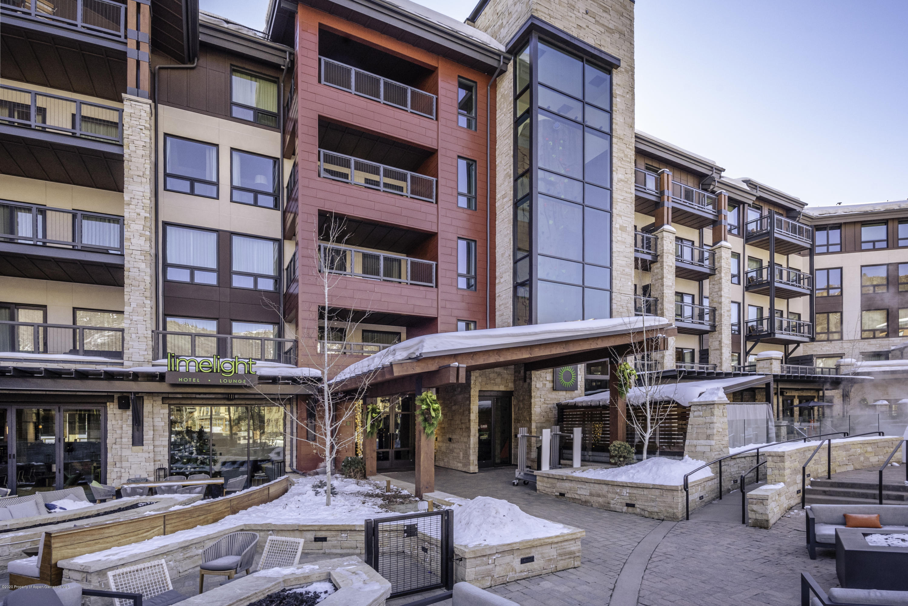 65 Wood Road, Unit 433 Snowmass Village, CO 81615 - Photo 26 of 27 a view of a building with a lot of windows