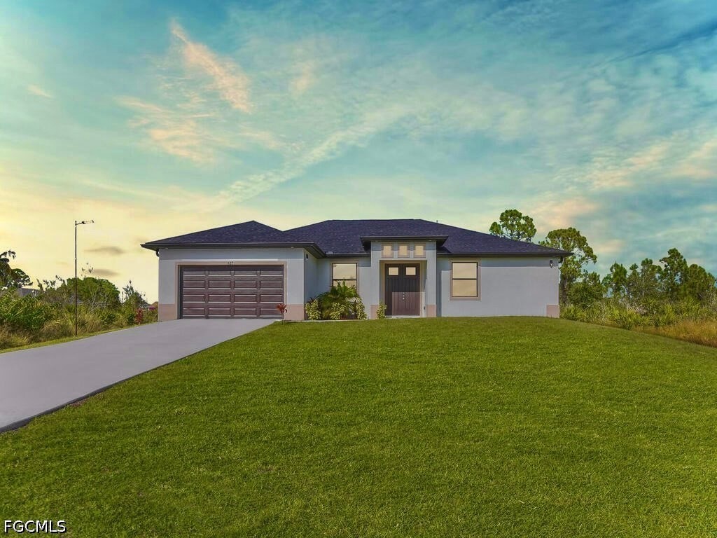 a view of a yard in front of a house