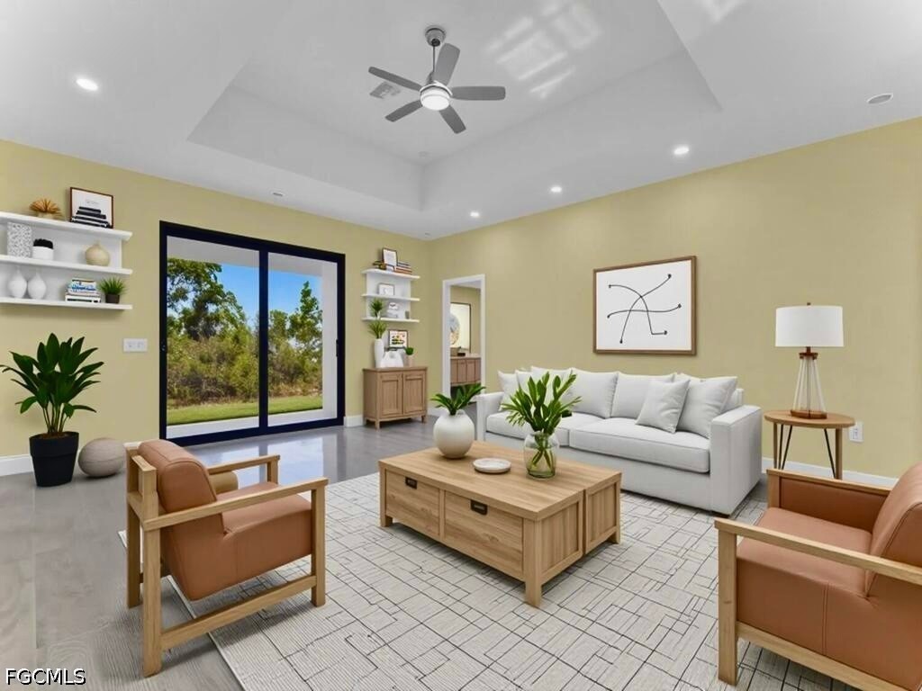 637 Cardinal Street East Lehigh Acres, FL 33974 - Photo 2 of 34 a living room with furniture and a large window