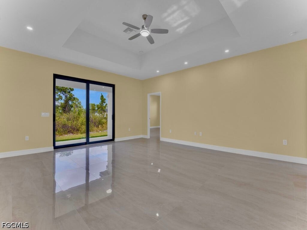 637 Cardinal Street East Lehigh Acres, FL 33974 - Photo 3 of 34 a view of an empty room with a window