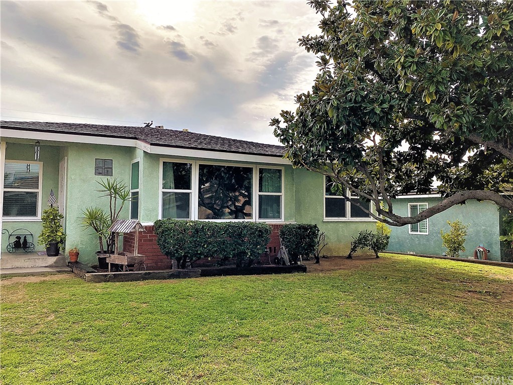 504 Union Place Brea, CA 92821 - Photo 1 of 1 a front view of a house with garden