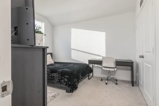 a living room with furniture and a couch