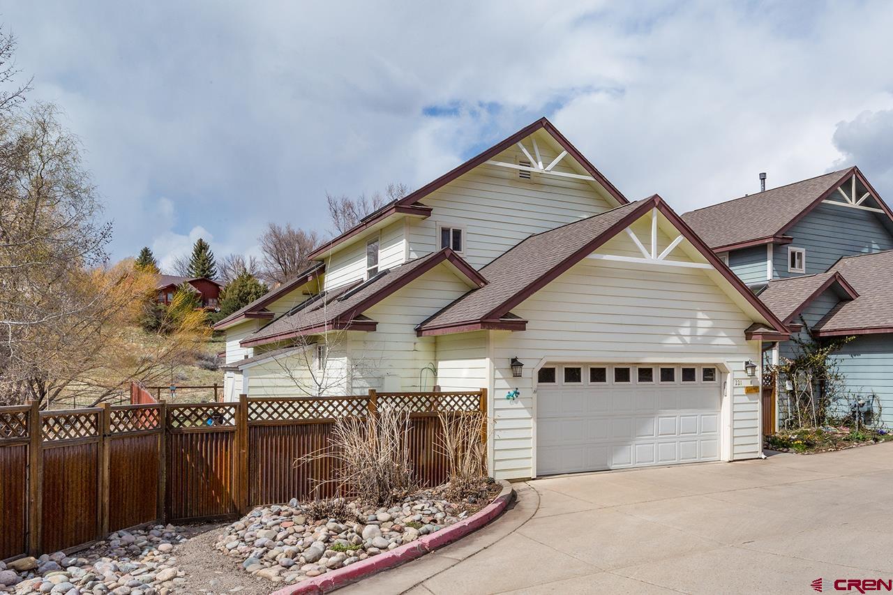221 Jenkins Ranch Road, Unit H Durango, CO 81301 - Photo 1 of 26 a view of a house with a balcony