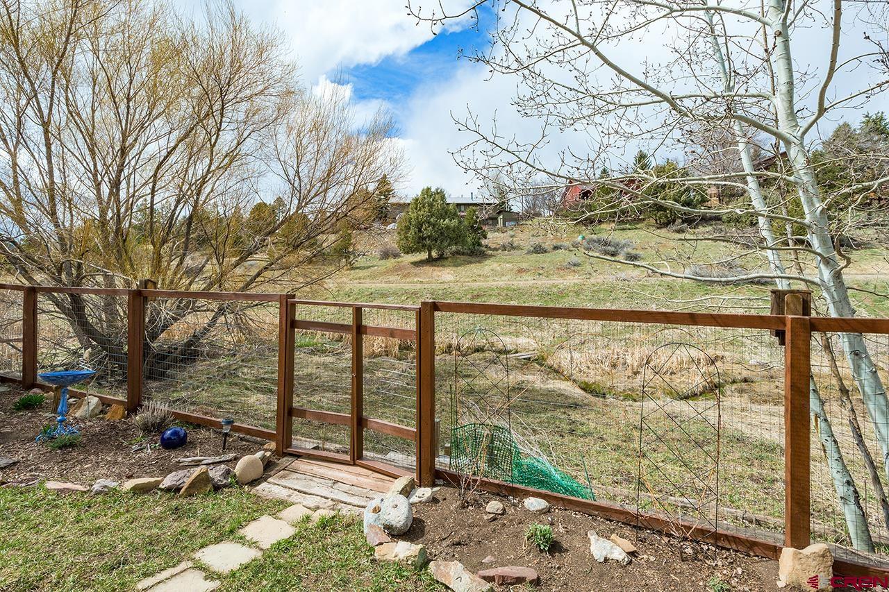 221 Jenkins Ranch Road, Unit H Durango, CO 81301 - Photo 23 of 26 a view of outdoor space with garden