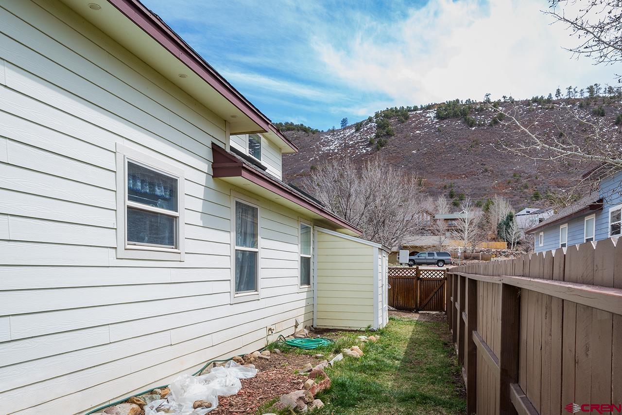221 Jenkins Ranch Road, Unit H Durango, CO 81301 - Photo 24 of 26 a backyard of a house with lots of green space