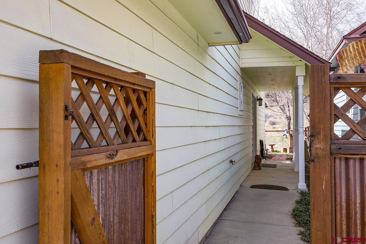 221 Jenkins Ranch Road, Unit H Durango, CO 81301 - Photo 3 of 26 a view of a door and wooden door